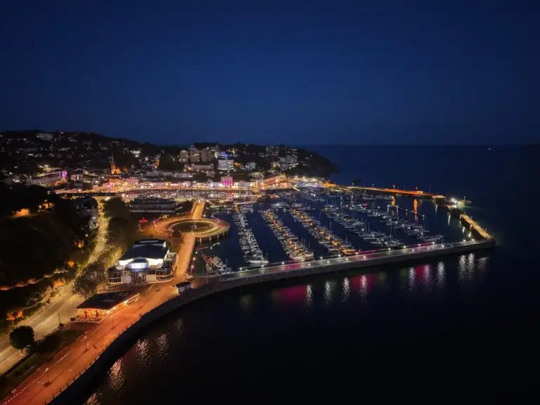 Drone image taken at night showing harbor. Still taken from drone video.